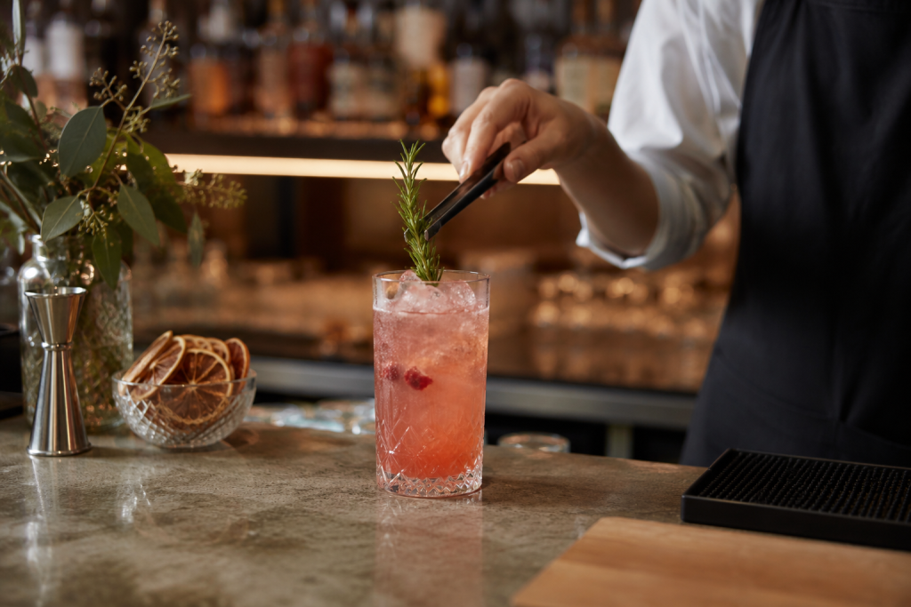 Bartender preparing a low and no alcohol cocktail at a New Zealand bar