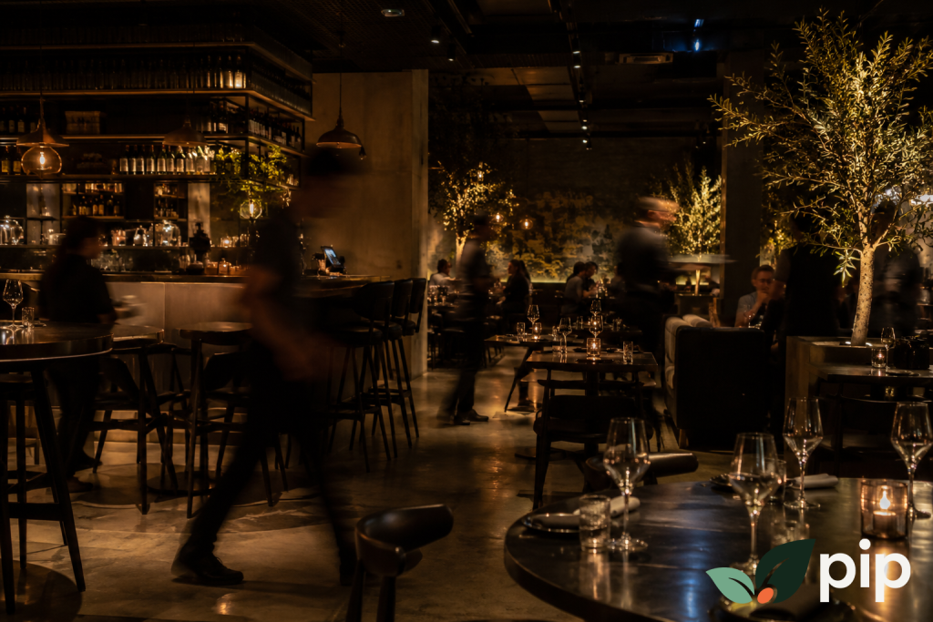 Diners enjoying an atmospheric experiential dining setting at a New Zealand restaurant